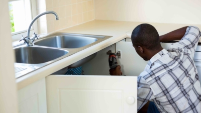 Man Repairing A Kitchen Sink 2021 08 28 22 15 15 Utc