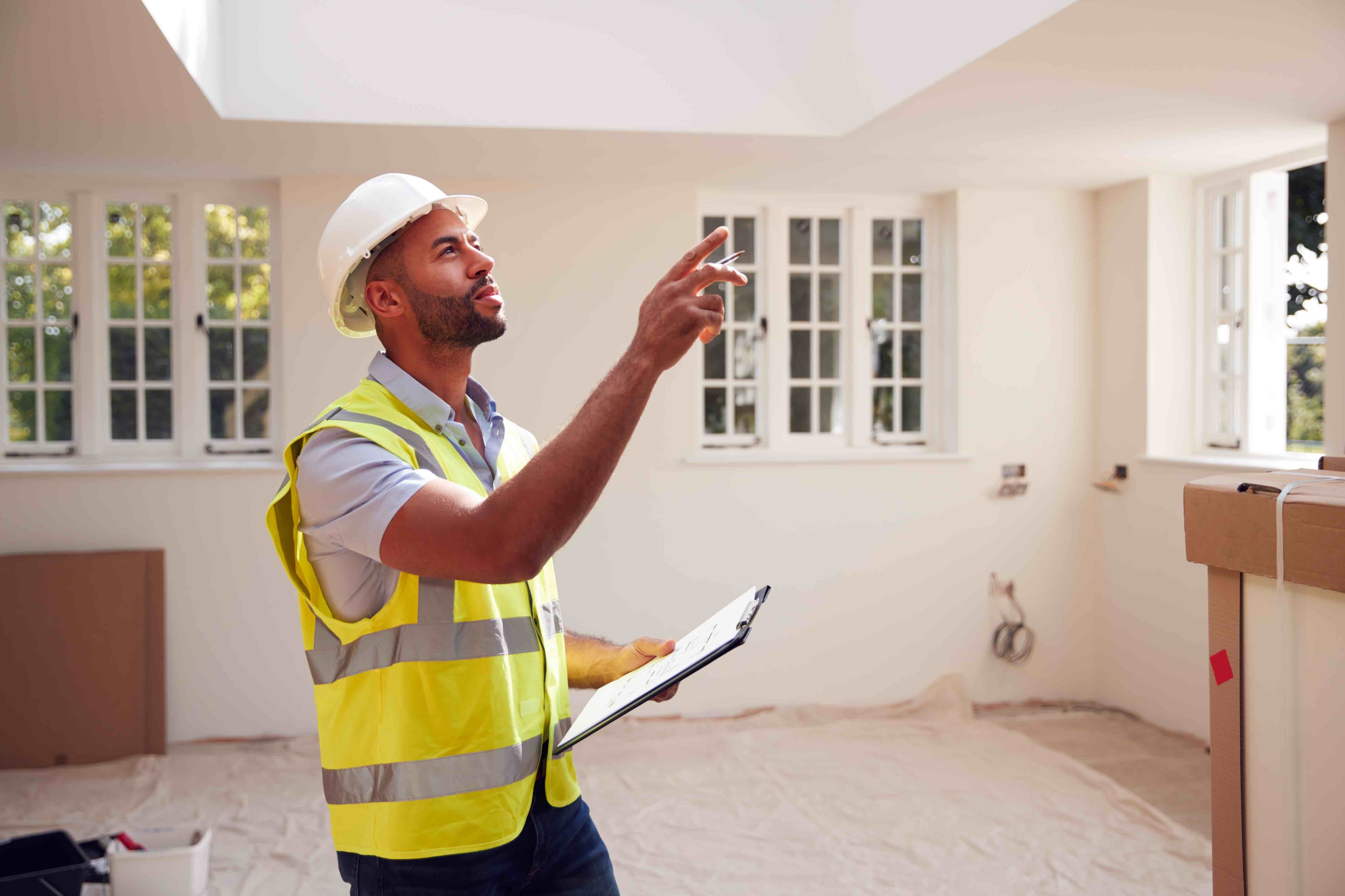 Building Surveyor Wearing Hard Hat With Clipboard 2021 08 30 08 39 36 Utc